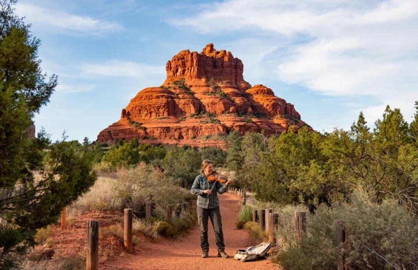 Tyler Carson performing as Fiddler on the Rock during a live music performance in Sedona, Arizona