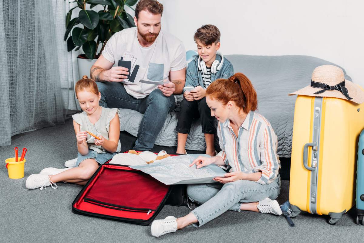 Multigenerational family planning room assignments and packing for a Sedona group trip