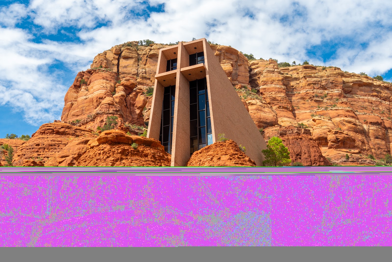 The Chapel of the Holy Cross built into the red rock in Sedona, best photographed in afternoon light