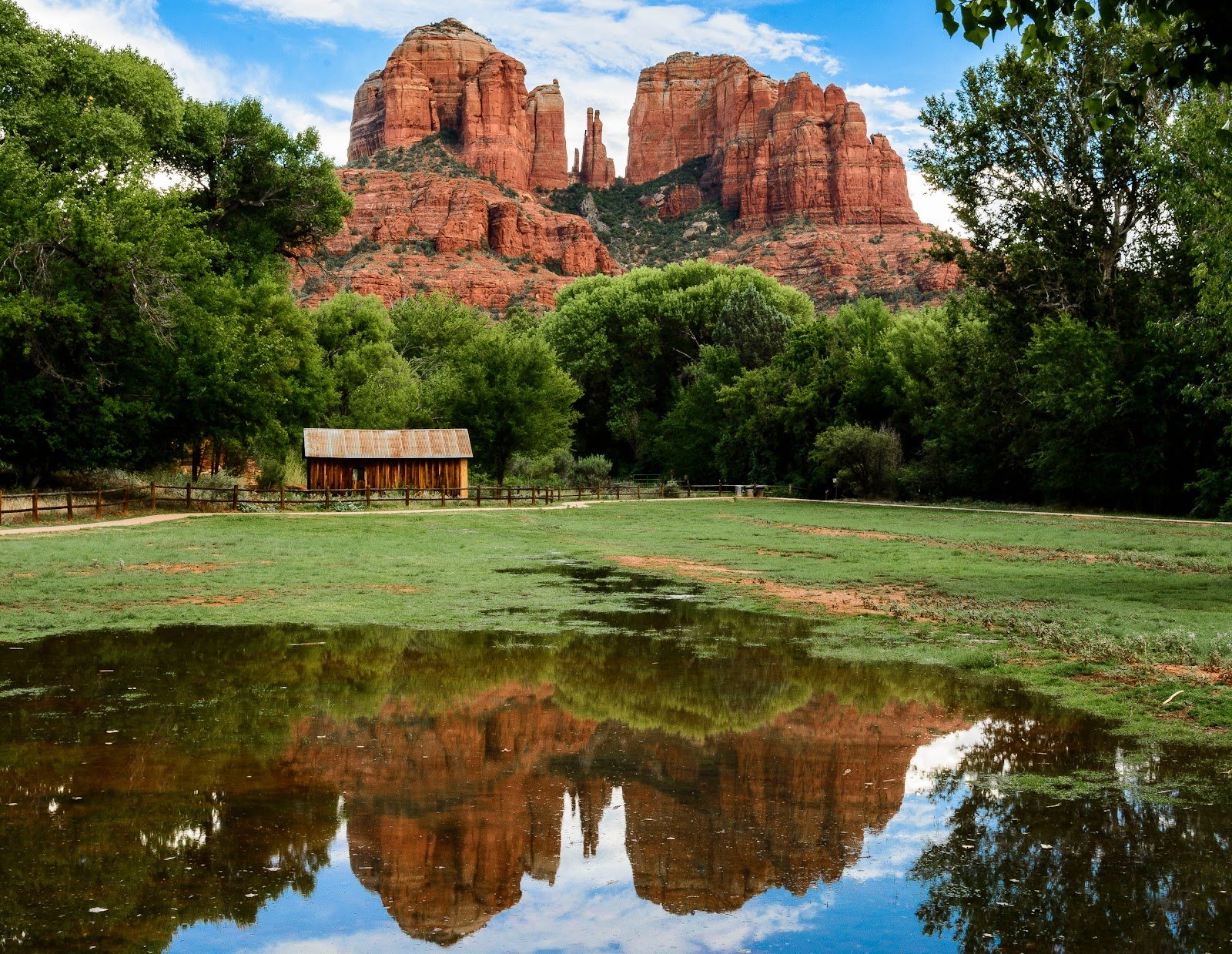 Sedona sunset light on Cathedral Rock, reflected in Oak Creek at Red Rock Crossing